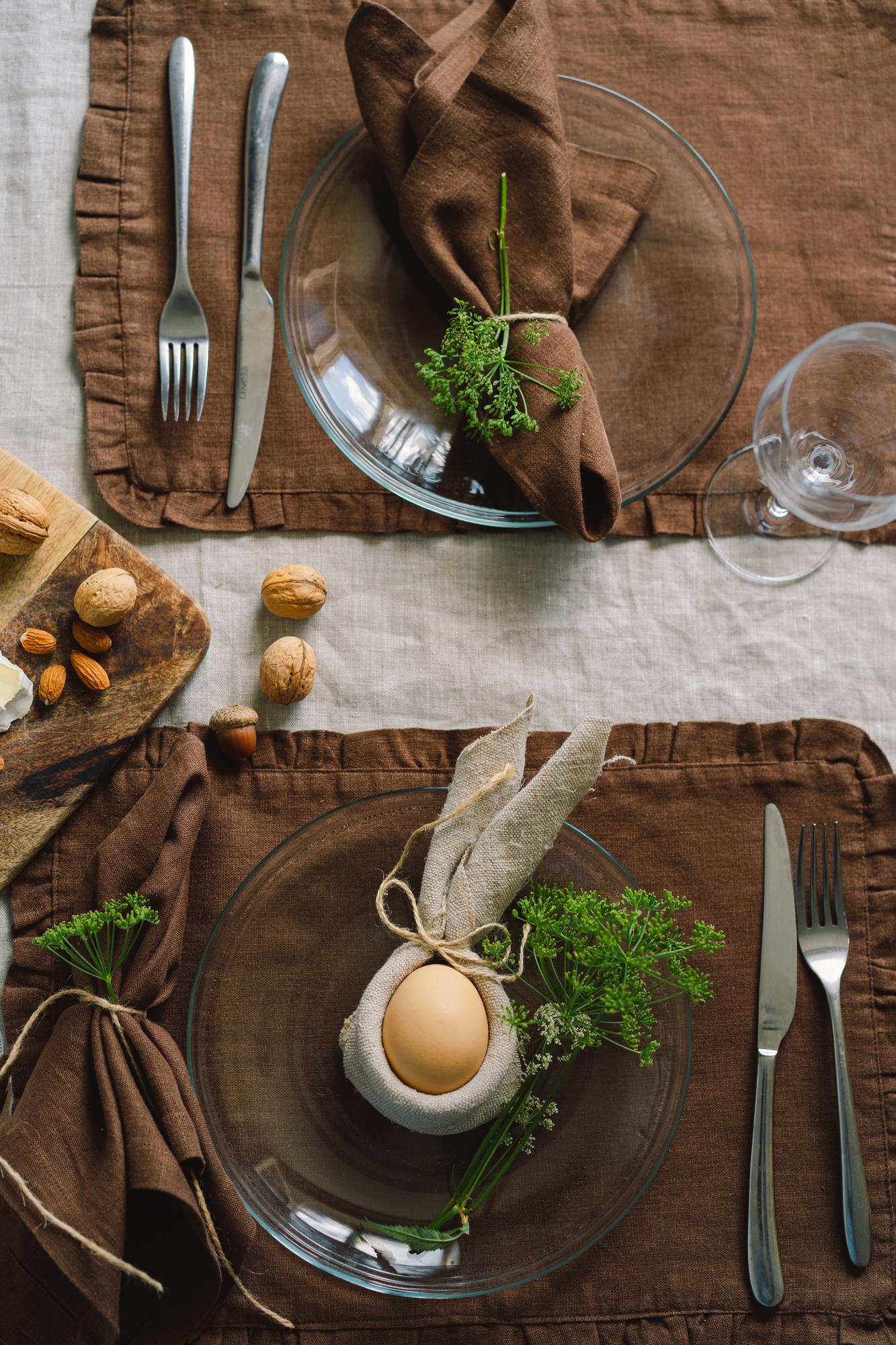 Styled set of plated menus laid out on wooden table